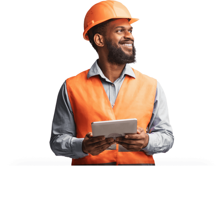 Field service engineer in orange overalls and PPE holding tablet computer.